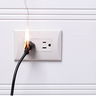 Electrical fire caused by faulty outlet or wiring